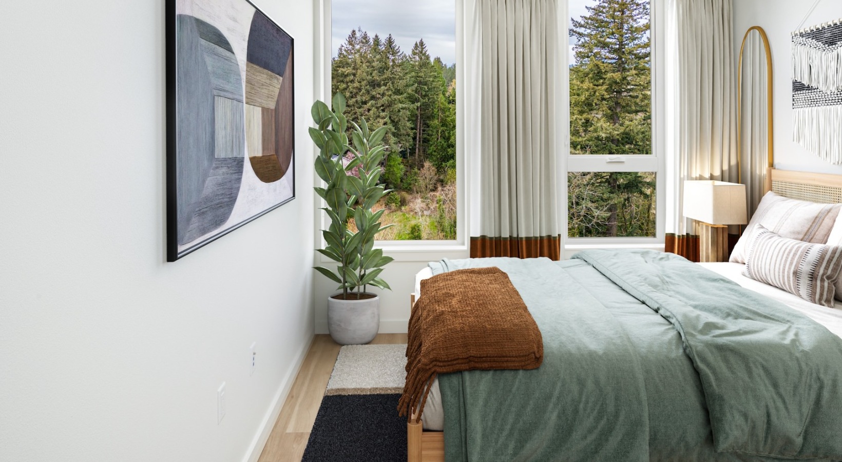 Bedroom options to fit every lifestyle bedroom with a plant and large windows
