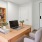 an office with a bookshelf