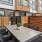 a walled patio with a table