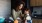 mother and little girl sit in their kitchen